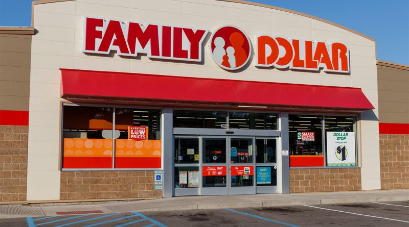 Image of a large Family Dollar store displaying it's red and white logo in front of a clear blue sky