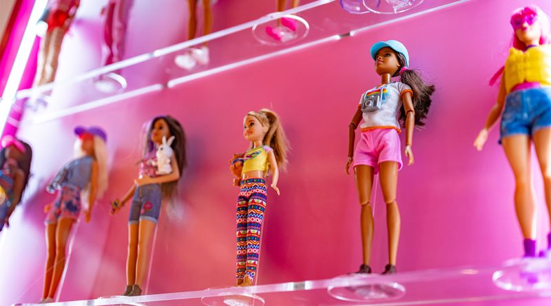 Barbie doll with insulin pump and glucose monitor representing Type 1 diabetes