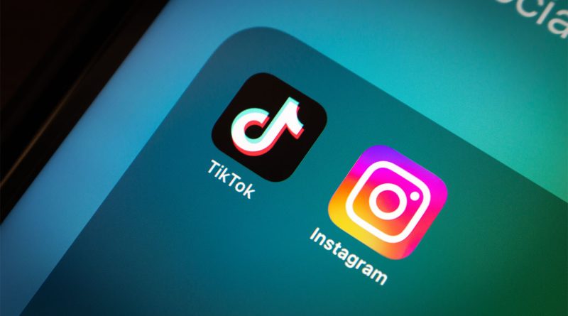 Why are luxury shoppers turning to TikTok and Instagram for product discovery? TikTok and Instagram logos on phone screen to support luxury shopping article