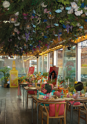 a vibrant, floral-themed interior of a restaurant or venue