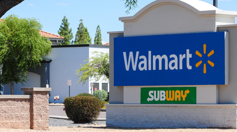 Walmart storefront sign featuring a Subway restaurant logo below it, highlighting the retailer's partnership with the sandwich chain and expansion into food delivery services.