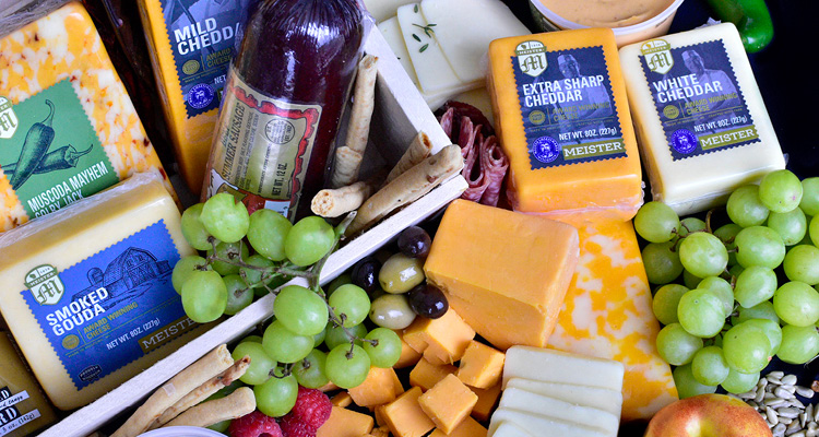 a Meister Cheese assortment featuring gourmet foods